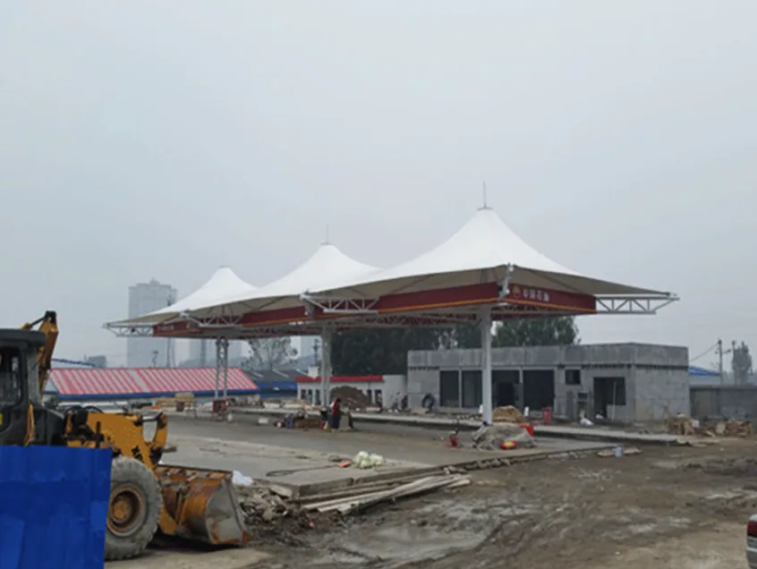 Landscape-led membrane canopies for fuel stations — reference image