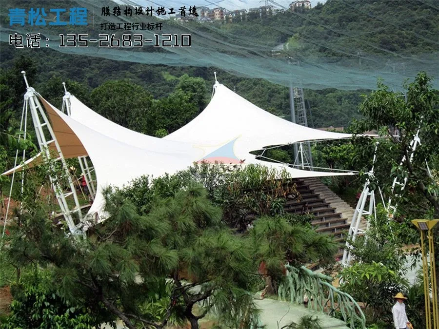 Hillside membrane canopies in relation to planting, steps and walking routes