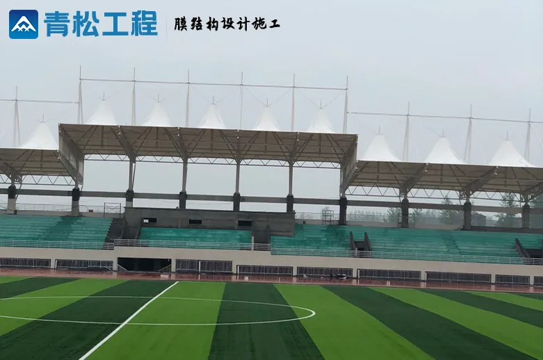 Membrane roof viewed from the field after sports-surface installation