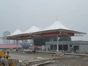 Landscape-led membrane canopies for fuel stations