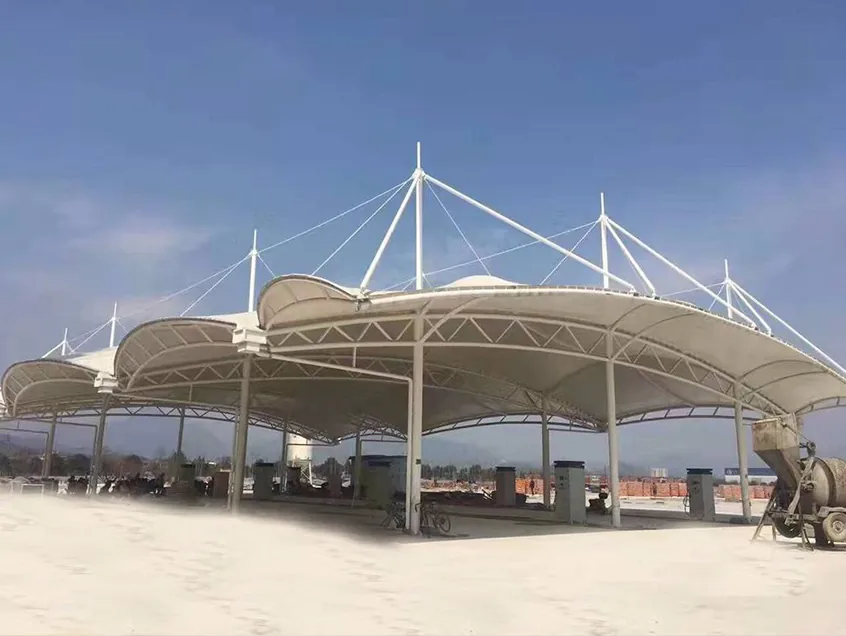 Large membrane shelters at fuel stations — reference image